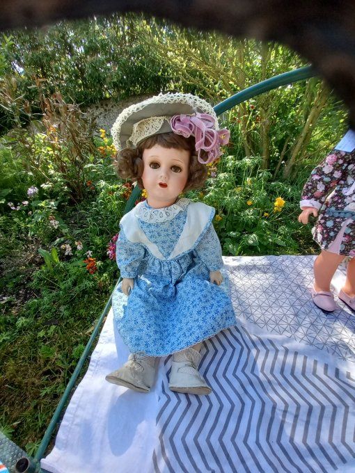 Poupee en composition 