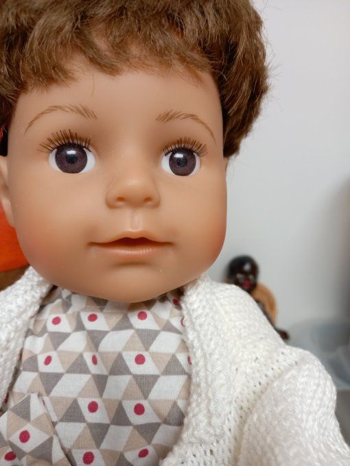 Baby born cheveux il mesure  45 cm